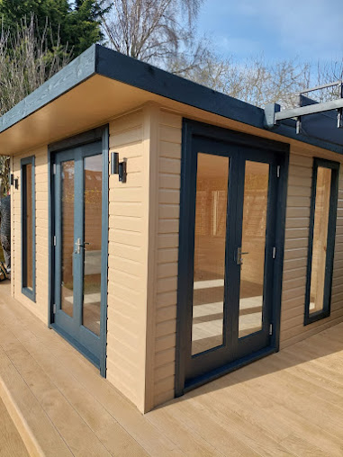 Insulated garden room and log cabin built by JCL Renovations